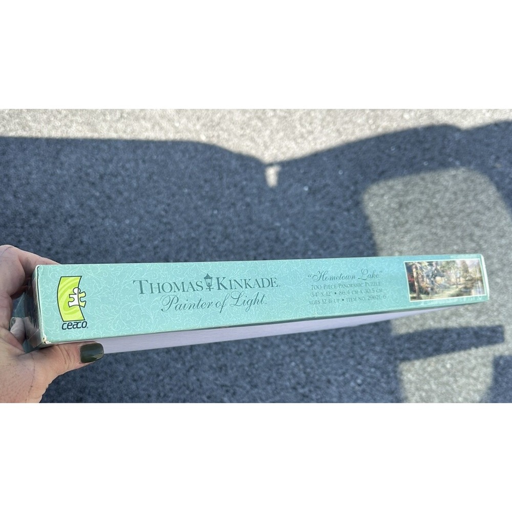 Thomas Kinkade Painter of Light 700 Piece Puzzle Hometown Lake 34"x12" SEALED - Picture 3 of 7